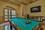 Terrace level game area with pool table